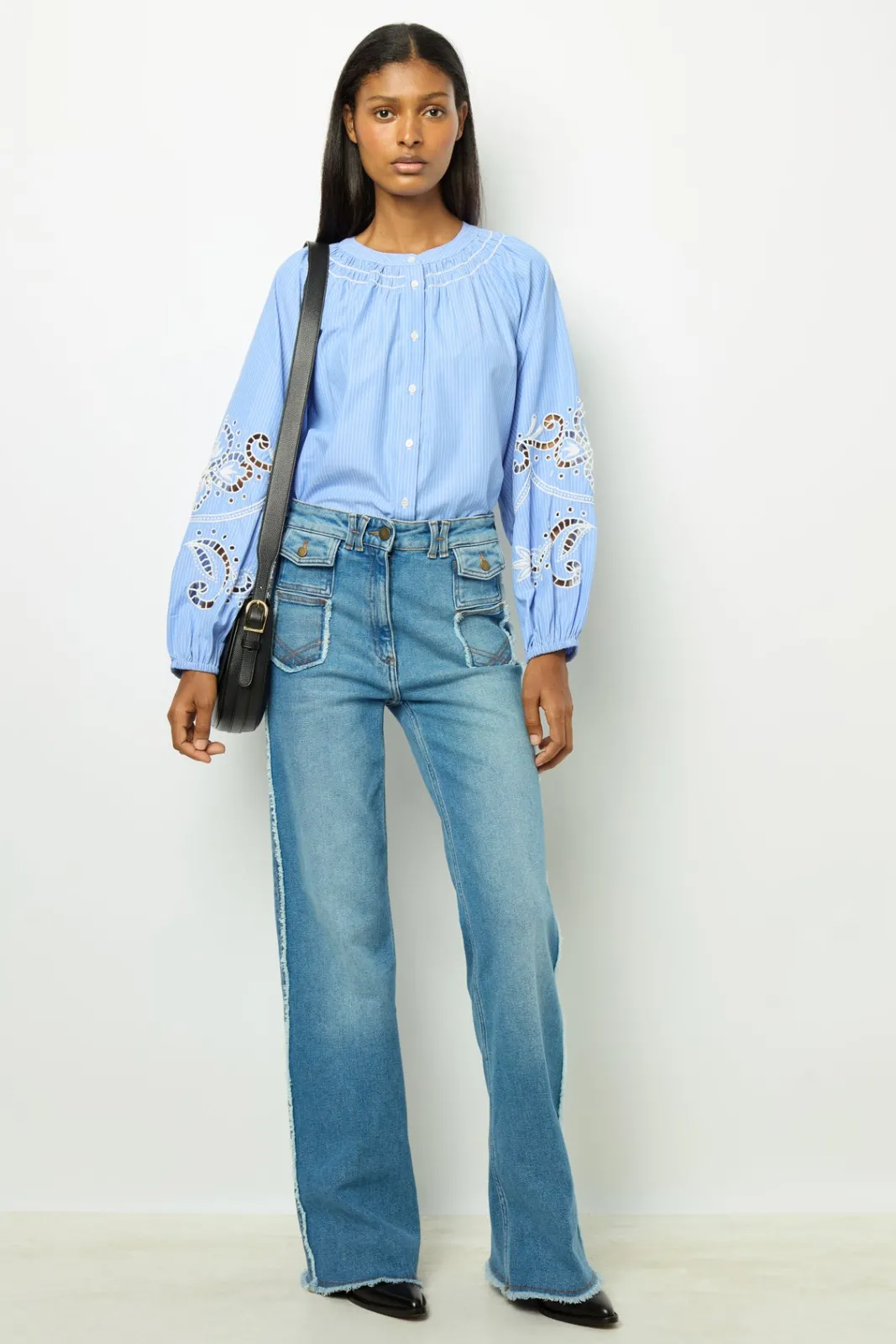 Outlet Flared jeans with fringes - ANNA Shirts & Blouses